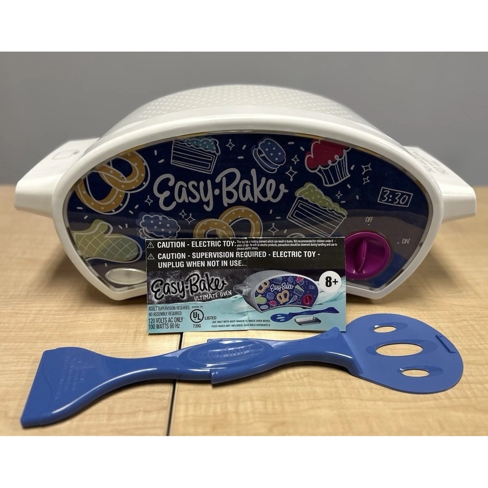 Easy Bake Oven Gently Used With Cooking Utensil. Powers on